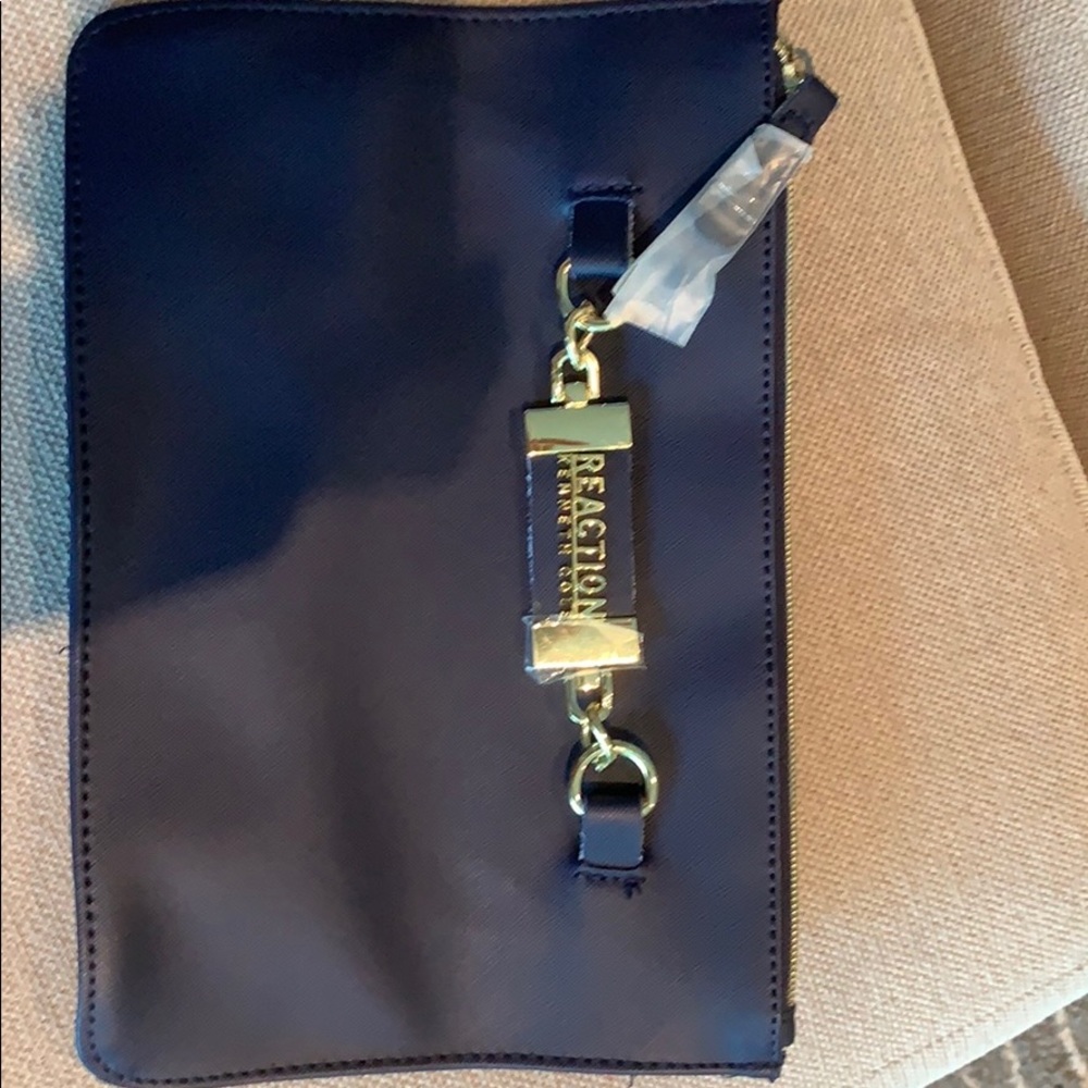 Reaction by Kenneth Cole large pouch